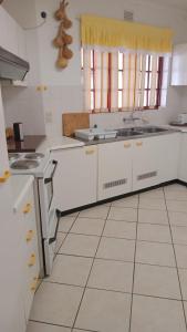 Kuchyň nebo kuchyňský kout v ubytování Bali Hai House