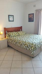 Postel nebo postele na pokoji v ubytování Bali Hai House + 17 fotografií