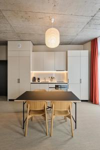 Kuchyňa alebo kuchynka v ubytovaní Ariv Design Hotel Zug