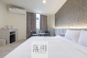 Voodi või voodid majutusasutuse hōo落雨 溫泉旅店 toas