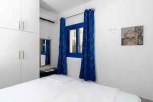 Postel nebo postele na pokoji v ubytování Stratos by mRoom Apartments