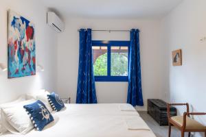 Postel nebo postele na pokoji v ubytování Stratos by mRoom Apartments