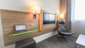 TV a/nebo společenská místnost v ubytování X Hotel + 31 fotografií