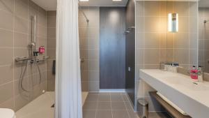 Koupelna v ubytování X Hotel