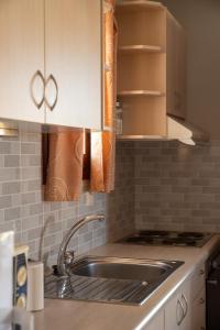 Kuchyň nebo kuchyňský kout v ubytování Stratos by mRoom Apartments + 37 fotografií