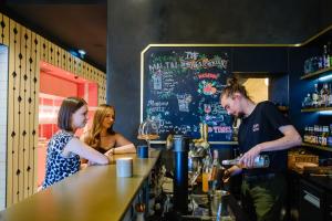 Boissons dans l'établissement Hôtel Tandem - Boutique Hôtel