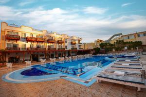 Bazén v ubytování Falcon Naama Star Hotel nebo v jeho okolí + 37 fotografií