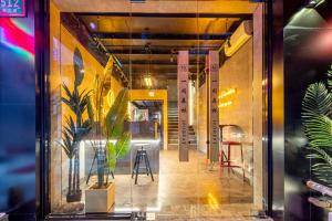 Foto sihtkohas Shanghai asuva majutusasutuse 一间森林酒店交通大学延安西路地铁站店 galeriist