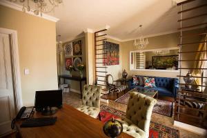 Televisyen dan/atau pusat hiburan di Mavuta Boutique Apartments