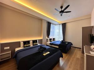 Postel nebo postele na pokoji v ubytování Hotel Lavie at Centrum