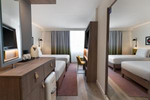 Hampton By Hilton Nuneaton客房内的一张或多张床位