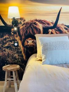 Postel nebo postele na pokoji v ubytování Le chalet des bons vivants