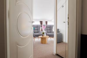 Garni Hotel Biser的休息区