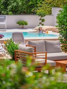 Bazén v ubytování Il Giardino Degli Aranci nebo v jeho okolí