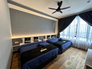 Postel nebo postele na pokoji v ubytování Hotel Lavie at Centrum