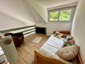 Ένα ή περισσότερα κρεβάτια σε δωμάτιο στο Villa Merlibeach - 3 logements 4 personnes