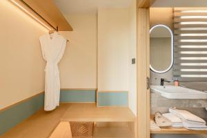 Koupelna v ubytování Tunchang Xiangshan Yunju Hotel