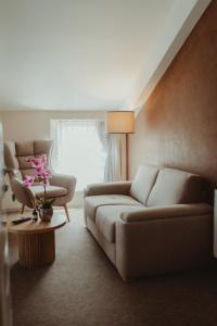 Garni Hotel Biser的休息区