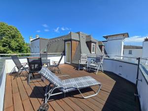 Ein Balkon oder eine Terrasse in der Unterkunft Strandvillen Binz - Ferienwohnung mit Panoramablick, 2 Schlafzimmern und Balkon SV-715