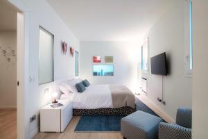 Posteľ alebo postele v izbe v ubytovaní The Art House - by MyHomeInComo