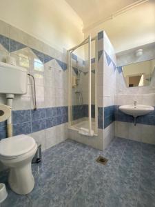 Kúpeľňa v ubytovaní Pető Apartman