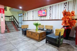 TV a/nebo společenská místnost v ubytování Hadassah Hotel