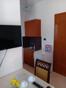 Kuchyň nebo kuchyňský kout v ubytování A-Vila