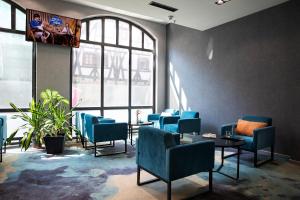 TV a/nebo společenská místnost v ubytování ACHAT Hotel Heppenheim