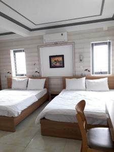 Katil atau katil-katil dalam bilik di Nguyet Anh Guesthouse