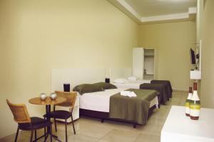 Postel nebo postele na pokoji v ubytování Blu Apart Hotel