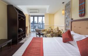 Postel nebo postele na pokoji v ubytování ARISON Hotel