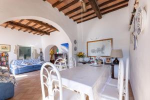 Ένα ή περισσότερα κρεβάτια σε δωμάτιο στο Dimora a Porto Azzurro Maria - Elba Affitti