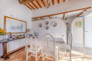 Η κουζίνα ή μικρή κουζίνα στο Dimora a Porto Azzurro Maria - Elba Affitti +13 φωτογραφίες