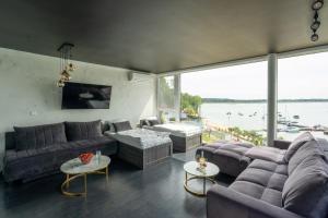 Posezení v ubytování OW Mewa domki apartamenty nad jeziorem