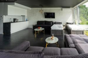 Posezení v ubytování OW Mewa domki apartamenty nad jeziorem