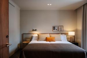 Postel nebo postele na pokoji v ubytování Hotel Rhin Garden + 22 fotografií