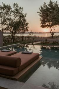 Bazén v ubytování Pure Beachfront Villa with Pool nebo v jeho okolí