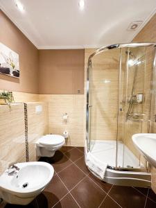 Ένα μπάνιο στο Calma Apartamenty Kameralne +23 φωτογραφίες