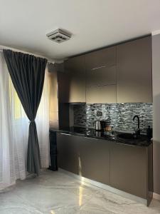 Η κουζίνα ή μικρή κουζίνα στο Silver studio at just 8 minutes distance of center