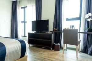 Μια τηλεόραση ή/και κέντρο ψυχαγωγίας στο Ramada Encore by Wyndham Chinatown Kuala Lumpur