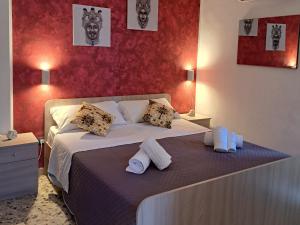 Posteľ alebo postele v izbe v ubytovaní b&b da zia maria