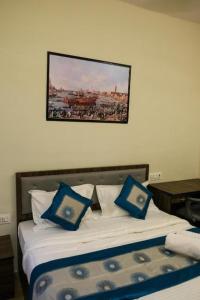 Postel nebo postele na pokoji v ubytování Hotel VRC