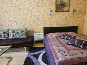 Postel nebo postele na pokoji v ubytování Vieno kambario butas su balkonu