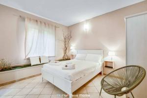 Postel nebo postele na pokoji v ubytování Niria - room Salice