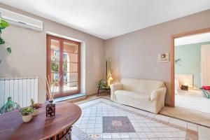 Postel nebo postele na pokoji v ubytování Niria - room Salice