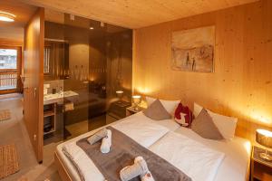 Posteľ alebo postele v izbe v ubytovaní Eichen Lodge Mellau