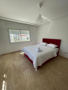 Complexe Bab Dikki客房内的一张或多张床位