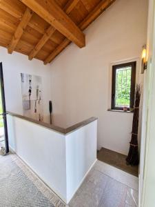 a room with a counter and a window at Oasi Ulivi in San Siro +55 photos