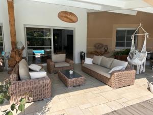 Posezení v ubytování Chambre d hôte village aéronautique Biscarrosse