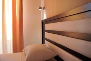 Cama ou camas em um quarto em Marku Palace